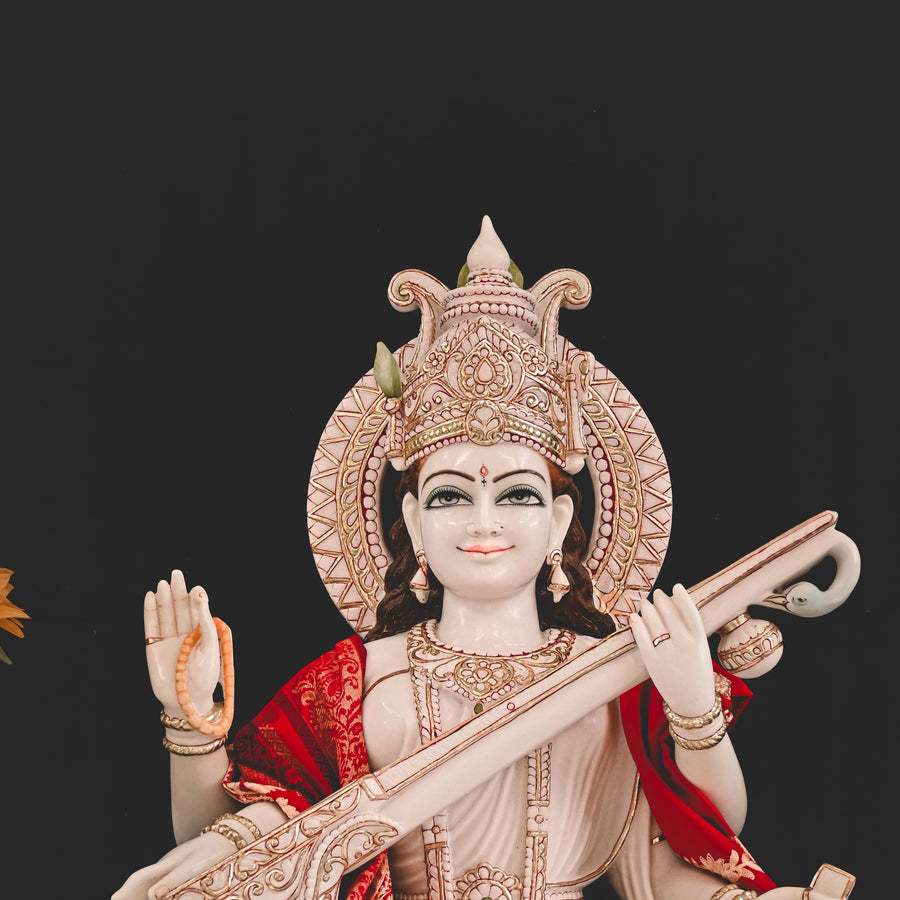 Goddess Saraswati statue with veena